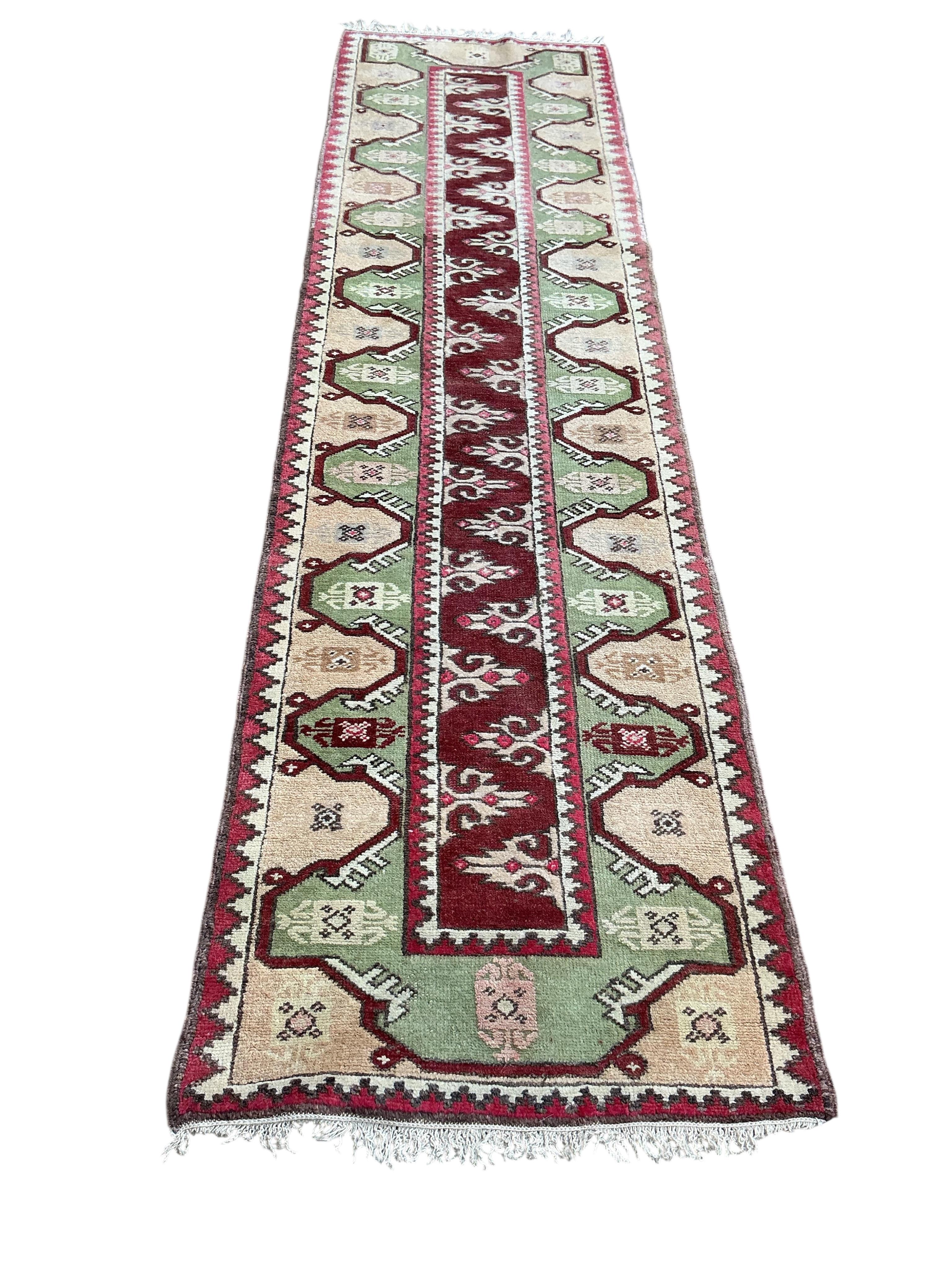 A Turkish polychrome runner, 270 x 72cm